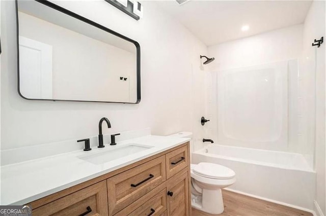 3105 Jones, Atlanta, GA 30344 - full bath featuring toilet, vanity, shower / bath combination, and wood finished floors