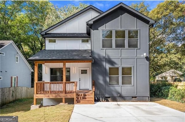 3105 Jones, Atlanta, GA 30344 - modern home featuring covered porch, fence, a shingled roof, and crawl space