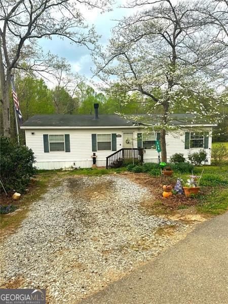 350 Kitty Hawk Ln, Clarkesville, GA 30523 - view of front facade featuring gravel driveway