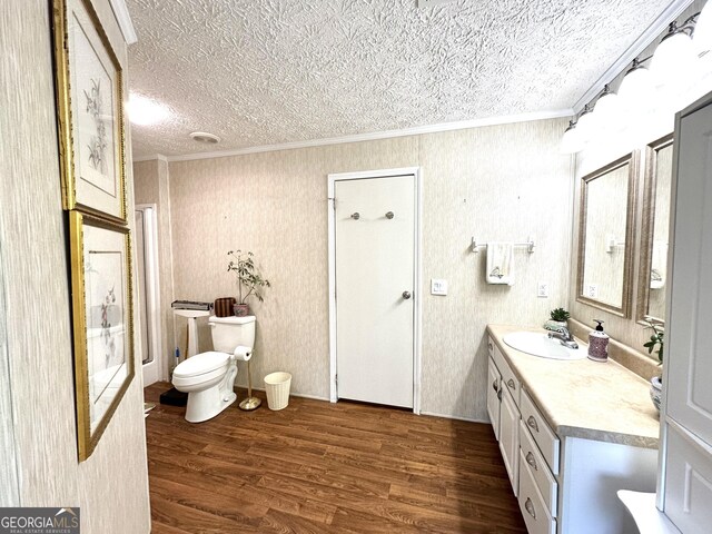 350 Kitty Hawk Ln, Clarkesville, GA 30523 - bathroom with crown molding, toilet, wood finished floors, and vanity