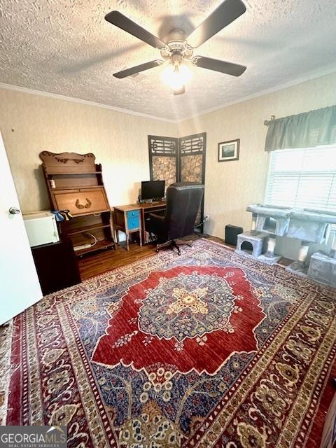 350 Kitty Hawk Ln, Clarkesville, GA 30523 - bedroom with crown molding, a textured ceiling, ceiling fan, and wood finished floors