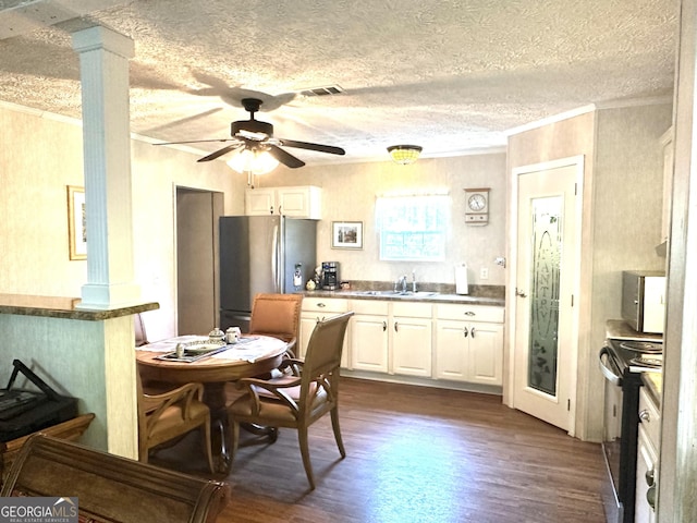 350 Kitty Hawk Ln, Clarkesville, GA 30523 - kitchen with crown molding, freestanding refrigerator, black range with electric cooktop, dark wood-style floors, and a sink