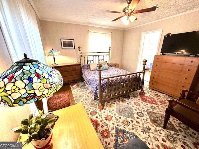 350 Kitty Hawk Ln, Clarkesville, GA 30523 - bedroom with crown molding, a textured ceiling, ceiling fan, and wood finished floors