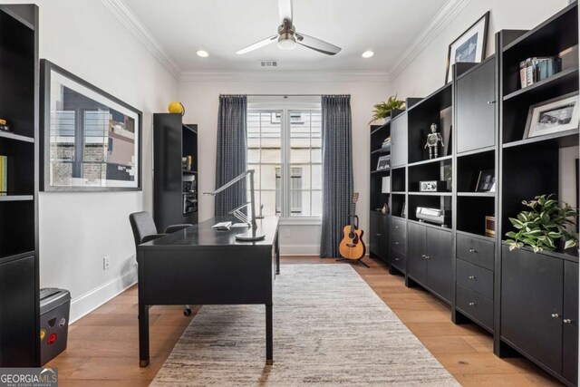 260 Jasmine Garden Way, Alpharetta, GA 30009 - home office with crown molding, light wood-type flooring, ceiling fan, and visible vents
