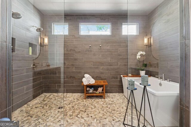 260 Jasmine Garden Way, Alpharetta, GA 30009 - full bath featuring walk in shower, a freestanding bath, and a healthy amount of sunlight