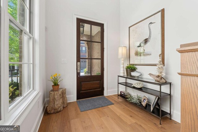 260 Jasmine Garden Way, Alpharetta, GA 30009 - doorway to outside featuring wood finished floors and baseboards
