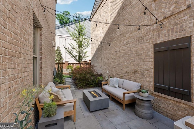 260 Jasmine Garden Way, Alpharetta, GA 30009 - view of patio / terrace featuring an outdoor living space with a fire pit