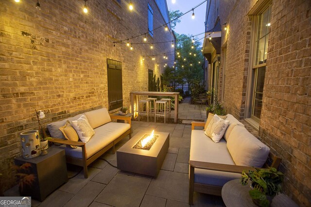 260 Jasmine Garden Way, Alpharetta, GA 30009 - view of patio / terrace with an outdoor living space with a fire pit