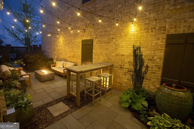 260 Jasmine Garden Way, Alpharetta, GA 30009 - view of patio with fence and an outdoor fire pit