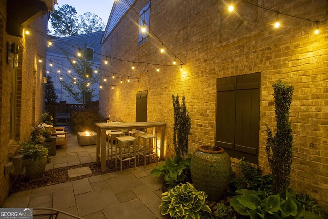 260 Jasmine Garden Way, Alpharetta, GA 30009 - view of patio with a fire pit