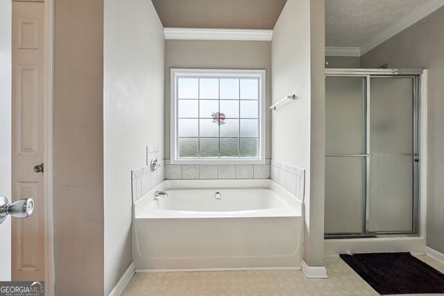 full bath featuring a garden tub, ornamental molding, baseboards, tile patterned floors, and a shower stall