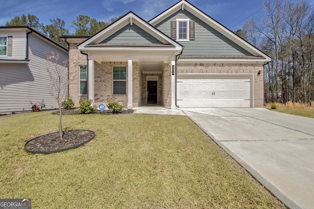 view of front of house featuring driveway, a front lawn, brick siding, and a garage
