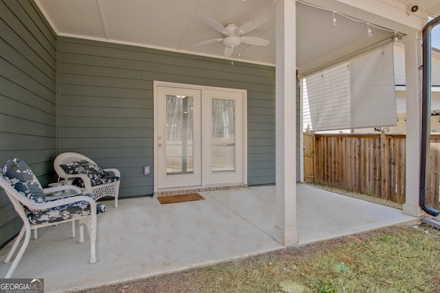 view of patio / terrace featuring a ceiling fan and fence