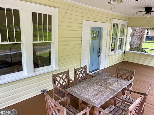 exterior space featuring a ceiling fan and outdoor dining space