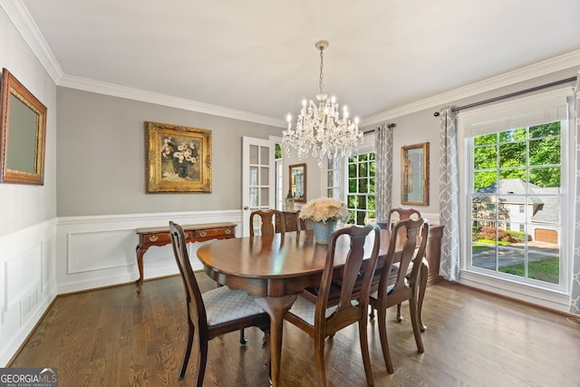 120 N Blf, Alpharetta, GA 30004 - dining space featuring a chandelier, dark wood-style flooring, crown molding, a wainscoted wall, and a decorative wall