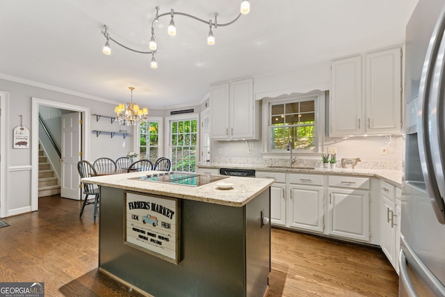120 N Blf, Alpharetta, GA 30004 - kitchen with stainless steel fridge with ice dispenser, black electric cooktop, a sink, a chandelier, and white cabinetry