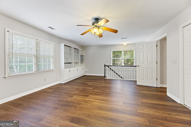 120 N Blf, Alpharetta, GA 30004 - spare room featuring wood finished floors, a ceiling fan, and baseboards