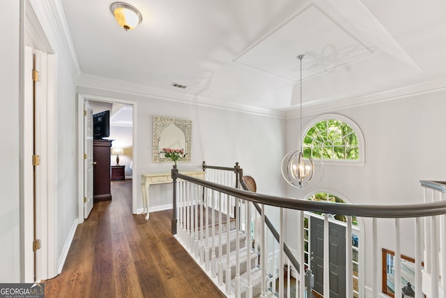 120 N Blf, Alpharetta, GA 30004 - hallway featuring an upstairs landing, dark wood finished floors, a chandelier, crown molding, and a tray ceiling