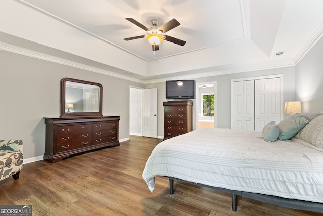 120 N Blf, Alpharetta, GA 30004 - bedroom featuring a tray ceiling, baseboards, wood finished floors, a ceiling fan, and crown molding