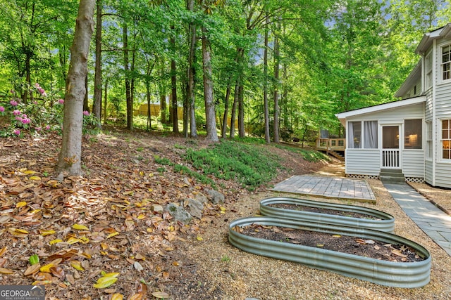 120 N Blf, Alpharetta, GA 30004 - view of yard with a wooden deck and a sunroom