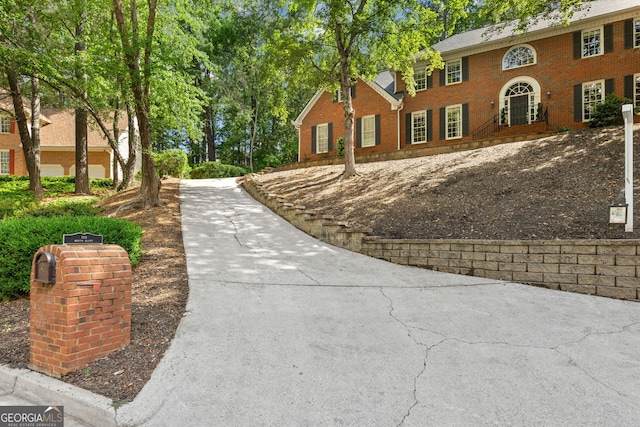 120 N Blf, Alpharetta, GA 30004 - view of front of house featuring brick siding and concrete driveway