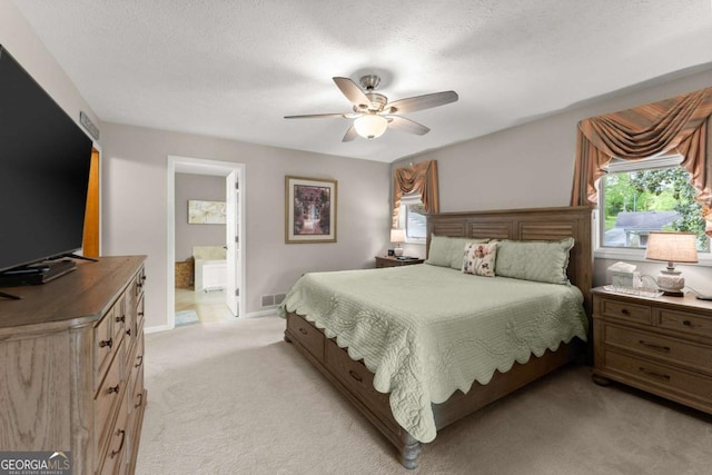 bedroom featuring baseboards, visible vents, light carpet, and multiple windows
