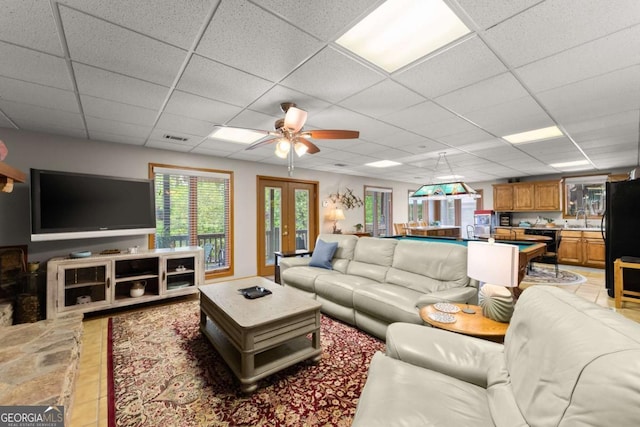 living area featuring visible vents, ceiling fan, pool table, and a paneled ceiling