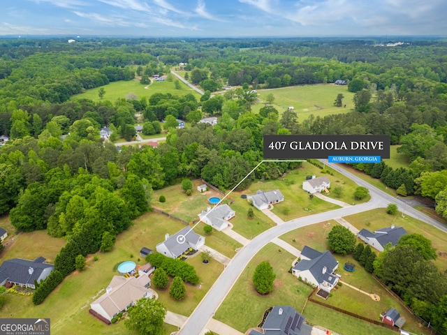 407 Gladiola Dr, Auburn, GA 30011 - aerial view featuring a residential view and a forest view