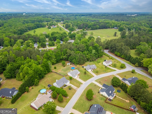 407 Gladiola Dr, Auburn, GA 30011 - birds eye view of property featuring a residential view and a forest view