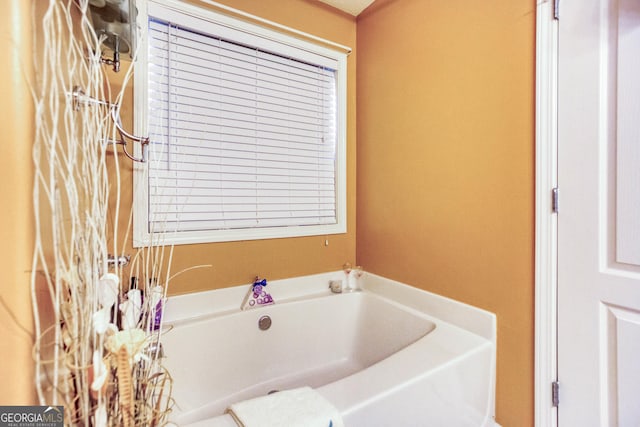 407 Gladiola Dr, Auburn, GA 30011 - full bathroom featuring a garden tub
