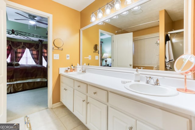 407 Gladiola Dr, Auburn, GA 30011 - full bath featuring tile patterned flooring, a sink, double vanity, and ensuite bathroom