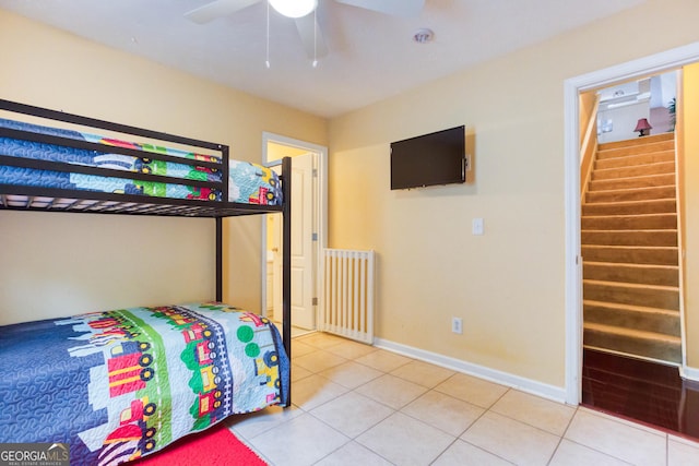 407 Gladiola Dr, Auburn, GA 30011 - bedroom with light tile patterned floors, ceiling fan, and baseboards