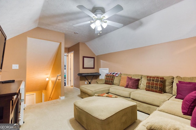 407 Gladiola Dr, Auburn, GA 30011 - living room with a ceiling fan, vaulted ceiling, light carpet, and baseboards