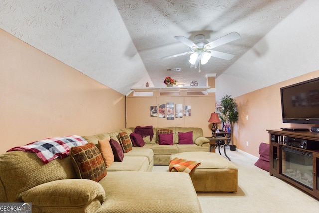 407 Gladiola Dr, Auburn, GA 30011 - living room with ceiling fan, visible vents, carpet, a textured ceiling, and lofted ceiling