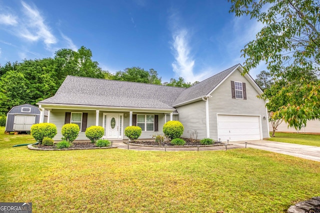 407 Gladiola Dr, Auburn, GA 30011 - view of front of home with concrete driveway, a shed, a porch, a front lawn, and a garage