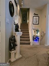 6193 Charring Cross Ct, Lithonia, GA 30058 - stairway featuring carpet