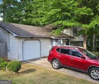 garage with driveway