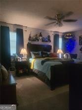 6193 Charring Cross Ct, Lithonia, GA 30058 - bedroom featuring multiple windows and ceiling fan