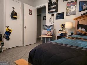 6193 Charring Cross Ct, Lithonia, GA 30058 - bedroom featuring carpet
