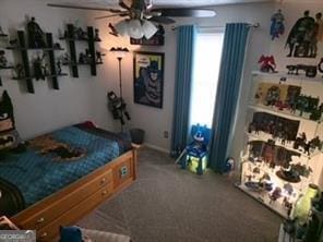 6193 Charring Cross Ct, Lithonia, GA 30058 - bedroom featuring carpet and ceiling fan