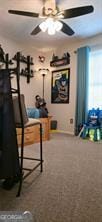 6193 Charring Cross Ct, Lithonia, GA 30058 - exercise area with carpet flooring and a ceiling fan