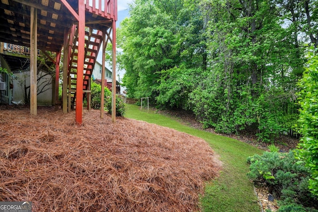 view of yard featuring stairs