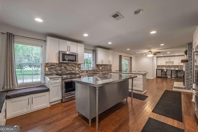 4240 Cascade Rd SW, Atlanta, GA 30331 - kitchen featuring recessed lighting, stainless steel appliances, a peninsula, and a sink