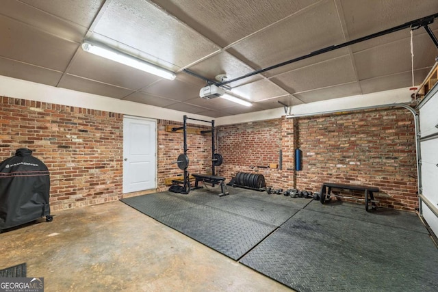 4240 Cascade Rd SW, Atlanta, GA 30331 - exercise area with a garage and brick wall