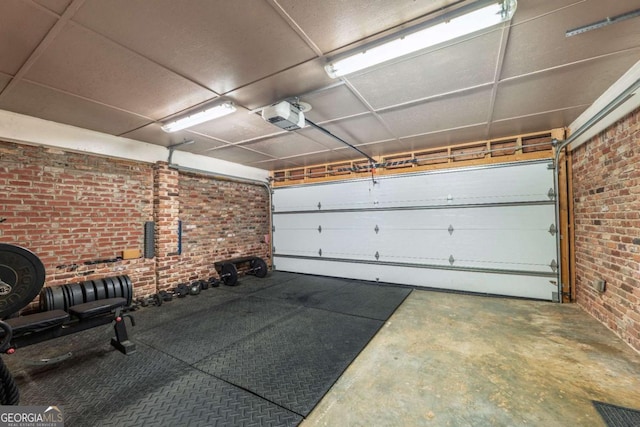 4240 Cascade Rd SW, Atlanta, GA 30331 - garage featuring visible vents and a garage door opener