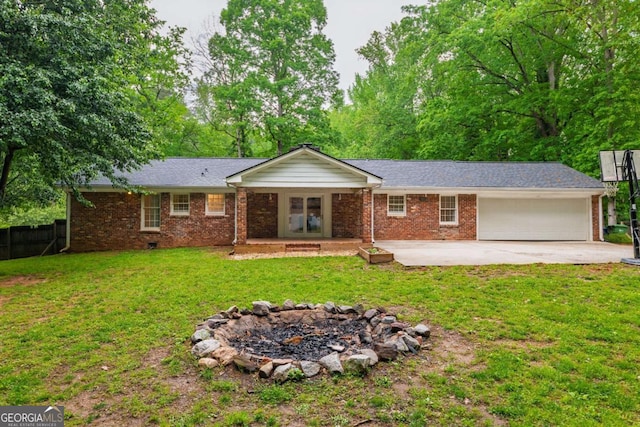 4240 Cascade Rd SW, Atlanta, GA 30331 - view of front facade featuring a front lawn, a garage, brick siding, concrete driveway, and fence