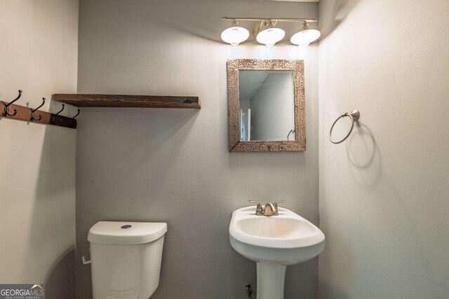 4240 Cascade Rd SW, Atlanta, GA 30331 - half bathroom with toilet and a sink
