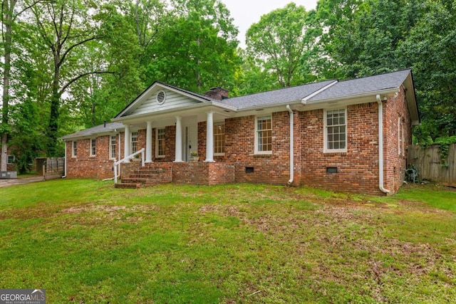 4240 Cascade Rd SW, Atlanta, GA 30331 - view of front facade featuring a chimney, covered porch, fence, brick siding, and a front lawn