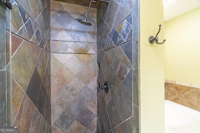 details featuring tiled shower