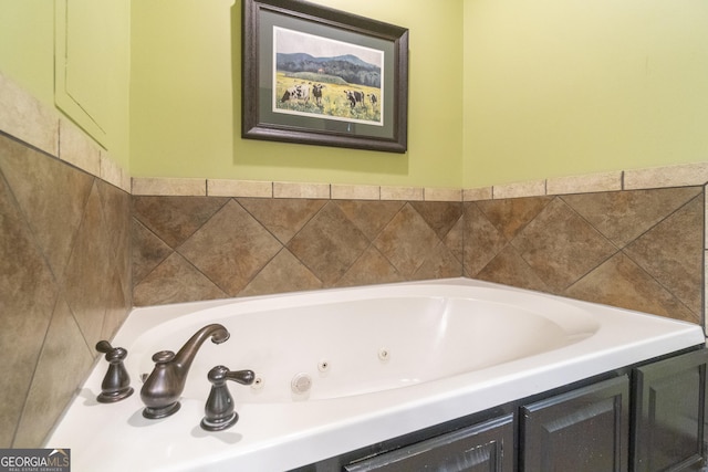 full bath with a jetted tub